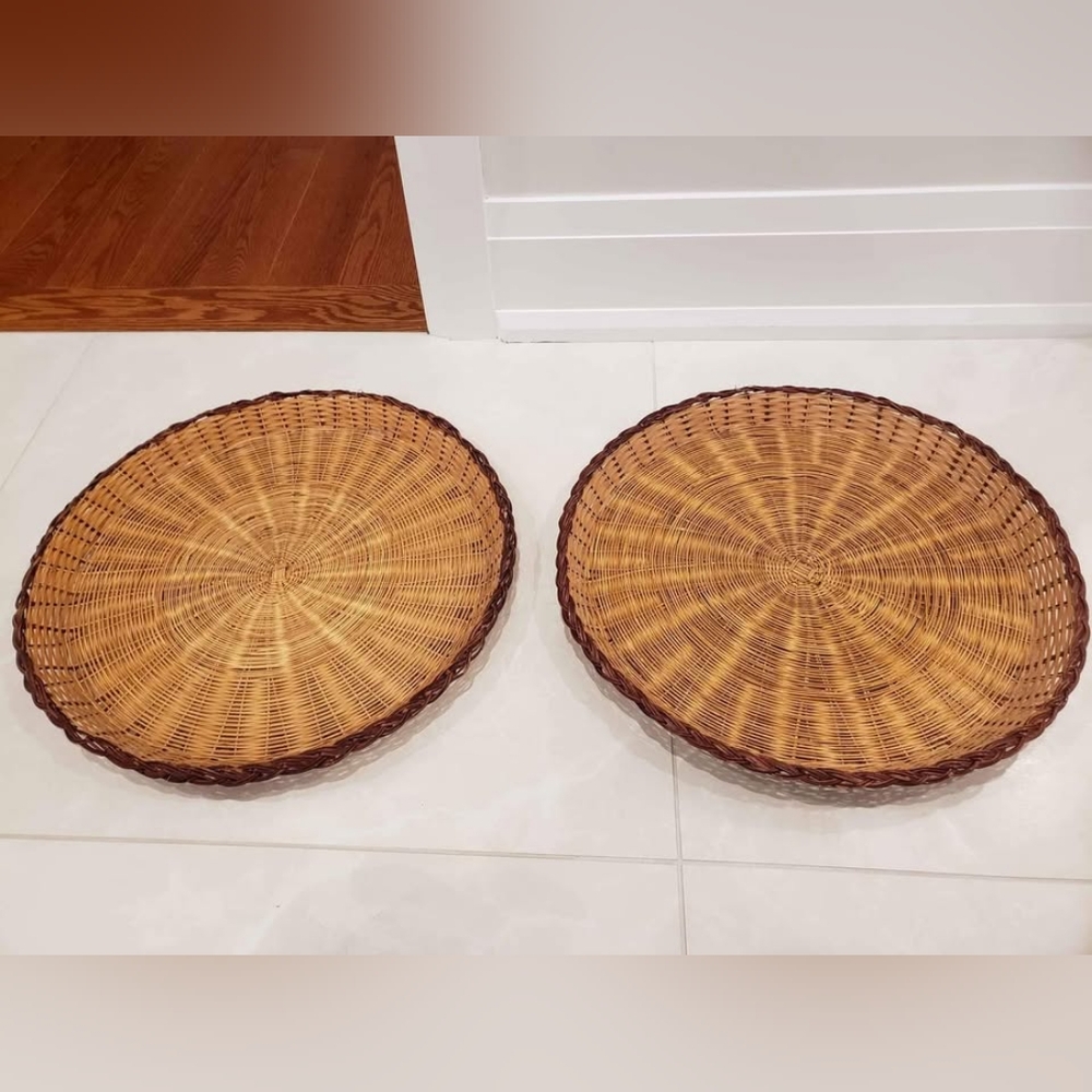 2 large round flat brown baskets
